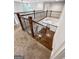 View of a staircase with wooden railings at 870 N Bethany Rd, Mcdonough, GA 30252