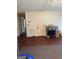 Living room showcasing a door and vinyl flooring at 241 E Ash St, Social Circle, GA 30025