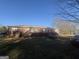 Rear exterior showcasing the large deck and backyard at 241 E Ash St, Social Circle, GA 30025