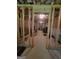 Unfinished basement framed and ready for your custom touches; ample space for storage and/or recreation at 65 Waters Edge Ln, Covington, GA 30014