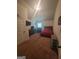 Spacious bedroom with carpet, a full bed and dresser at 65 Waters Edge Ln, Covington, GA 30014