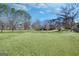 Expansive backyard with trees and open space at 606 Ginger Cake Rd, Fayetteville, GA 30214