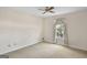 Neutral bedroom featuring wall to wall carpeting and curtains at 606 Ginger Cake Rd, Fayetteville, GA 30214