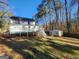 House with deck and storage shed in backyard at 1879 Wrights Way, Jonesboro, GA 30236