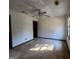 Spacious bedroom with ceiling fan and window at 1879 Wrights Way, Jonesboro, GA 30236