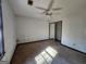 Well-lit bedroom with mirrored closet doors at 1879 Wrights Way, Jonesboro, GA 30236