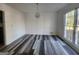 Bright dining room with large windows and vinyl flooring at 1879 Wrights Way, Jonesboro, GA 30236