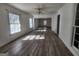 Large living room with vinyl flooring and lots of natural light at 1879 Wrights Way, Jonesboro, GA 30236