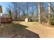 Large backyard with shed and mature trees at 3076 Carriage Trl, Jonesboro, GA 30236