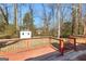 Spacious deck overlooks private backyard with storage shed at 3076 Carriage Trl, Jonesboro, GA 30236