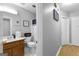 Clean bathroom with shower/tub combo and wood vanity at 3076 Carriage Trl, Jonesboro, GA 30236