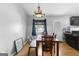 Casual dining area with wood floors and a bench at 3076 Carriage Trl, Jonesboro, GA 30236