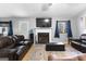 Cozy living room featuring a fireplace and comfortable seating at 3076 Carriage Trl, Jonesboro, GA 30236
