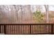 Scenic view of nature from a private outdoor wooden balcony at 1320 Newbridge Cir, Buford, GA 30519
