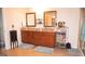Spacious bathroom with double sinks, granite countertops, and a glass-enclosed shower at 1320 Newbridge Cir, Buford, GA 30519