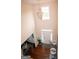Open foyer view from above showcases hardwood floors and sophisticated decor at 1320 Newbridge Cir, Buford, GA 30519