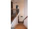 Wooden Staircase and landing in a two story home at 1320 Newbridge Cir, Buford, GA 30519