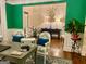 Home office space with a view into the foyer and tasteful decor at 1320 Newbridge Cir, Buford, GA 30519