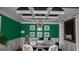 Office with built-in shelving, stylish lighting, and calming color scheme at 1320 Newbridge Cir, Buford, GA 30519