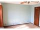 Spacious bedroom with light blue walls and neutral carpeting at 1760 Upland Ridge Nw Dr, Conyers, GA 30012