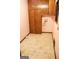 Laundry room with tile floor and wooden cabinets at 1760 Upland Ridge Nw Dr, Conyers, GA 30012