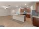 Modern kitchen featuring stainless steel appliances, granite countertops, and a kitchen island at 144 Oliver Dr, Locust Grove, GA 30248