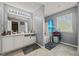 Bathroom with a separated shower, large vanity, and tile flooring at 8264 Milam Loop, Fairburn, GA 30213