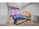 Bedroom with grey walls, carpeted floor and a window at 8264 Milam Loop, Fairburn, GA 30213