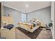 Bedroom features a bed, a dresser, carpeted floor and a window bringing in natural light at 8264 Milam Loop, Fairburn, GA 30213