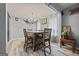 Dining room area featuring hardwood floors and natural light at 8264 Milam Loop, Fairburn, GA 30213