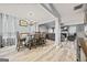 Dining room with modern chandelier and a clear view into the living room at 8264 Milam Loop, Fairburn, GA 30213