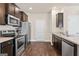 Well-equipped kitchen featuring stainless steel appliances at 11976 Lovejoy Crossing Pl, Hampton, GA 30228