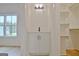 White vanity with black hardware and open shelving in closet at 260 Cicely Way, Tyrone, GA 30290