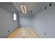 Spacious bedroom with light gray walls and hardwood floors at 260 Cicely Way, Tyrone, GA 30290