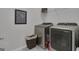 Modern laundry room with stainless steel washer and dryer, and stylish decor at 720 Lanarck Way, Peachtree City, GA 30269