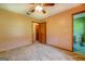 Bedroom with ceiling fan and carpet flooring at 5225 Bailey Sw Rd, Conyers, GA 30094