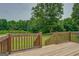 Spacious back deck overlooks a large backyard with mature trees at 1198 E Atlanta Rd, Stockbridge, GA 30281