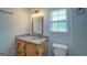 Bathroom with granite vanity and wood cabinets at 1198 E Atlanta Rd, Stockbridge, GA 30281