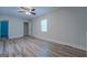 Bright bedroom featuring wood-look flooring at 1198 E Atlanta Rd, Stockbridge, GA 30281