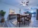 Bright dining area with hardwood floors and modern light fixture at 1198 E Atlanta Rd, Stockbridge, GA 30281
