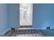 Long hallway with light walls and hardwood floors at 1198 E Atlanta Rd, Stockbridge, GA 30281