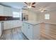 Open concept kitchen with island and stainless steel appliances at 1198 E Atlanta Rd, Stockbridge, GA 30281