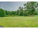Large lot with lush green grass at 1198 E Atlanta Rd, Stockbridge, GA 30281