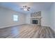 Living room with hardwood floors and ceiling fan at 1198 E Atlanta Rd, Stockbridge, GA 30281