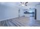 Open living room with hardwood floors and kitchen view at 1198 E Atlanta Rd, Stockbridge, GA 30281