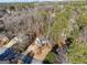 Aerial view of house in a wooded neighborhood at 3536 Evans Ridge Trl, Atlanta, GA 30340