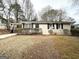 Brick ranch home with a neat lawn and satellite dish at 50 Macon Se Pl, Atlanta, GA 30354