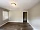 Bright living room with hardwood floors and neutral walls at 50 Macon Se Pl, Atlanta, GA 30354