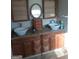 Double vanity bathroom with granite countertops and cabinets at 6238 Lance Ln, Riverdale, GA 30274