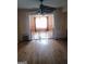 Hardwood floor dining room with view to living room at 6238 Lance Ln, Riverdale, GA 30274